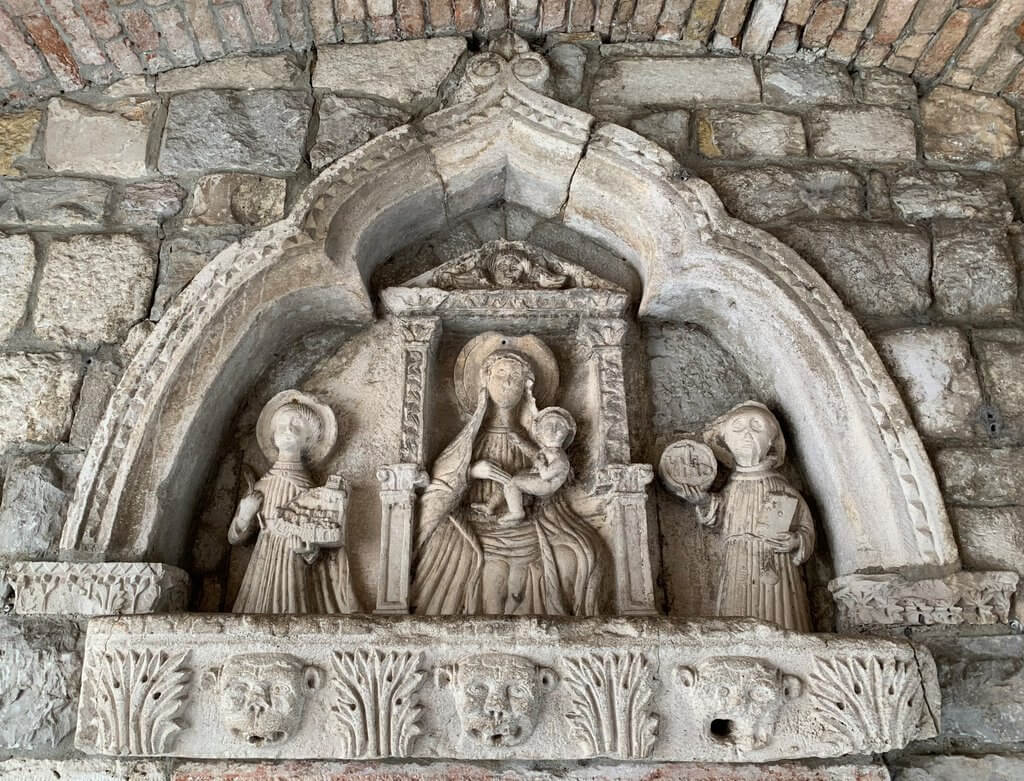 Kotor old town sea gate gothic relief