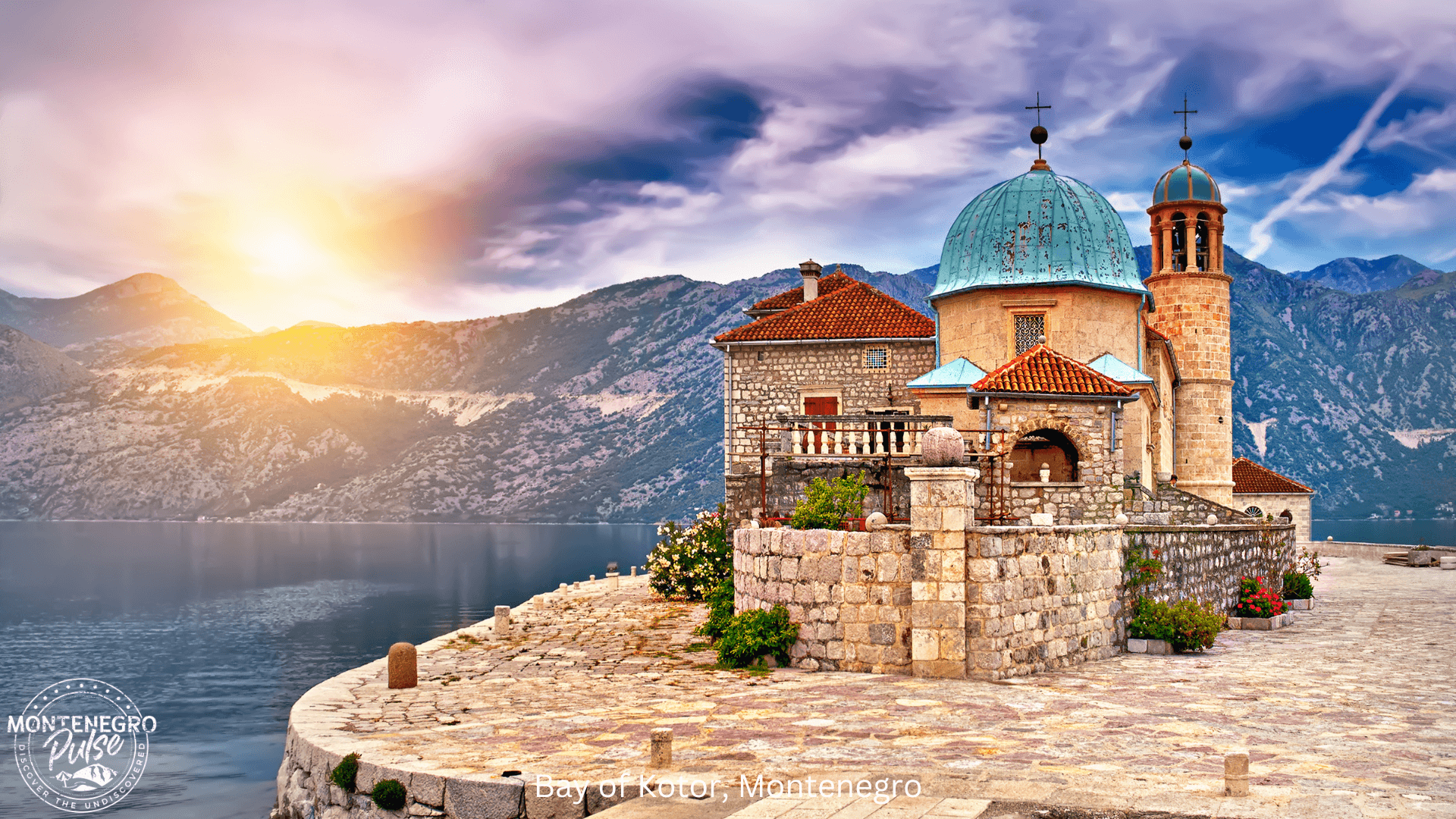 Beautiful sunset view of Our Lady of the Rocks in the Bay of Kotor, Montenegro, with mountains in the background