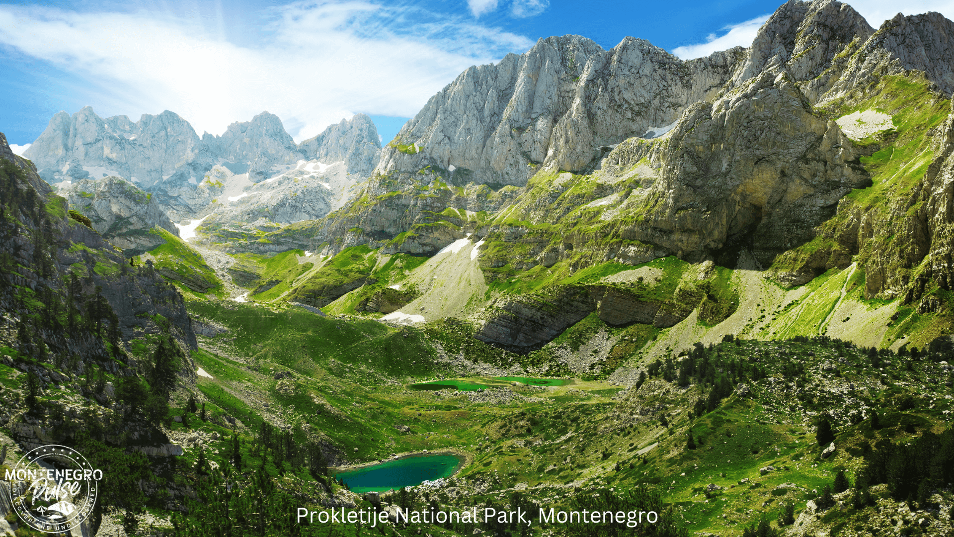 Majestic mountain scenery with lush green valleys and lakes in Prokletije National Park, Montenegro.
