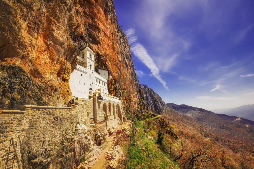 Ostrog Monastery Guide to Visit Ostrog Monastery in Montenegro. Discover Ostrog Monastery - the history, the miracles, what to wear and how to get there.