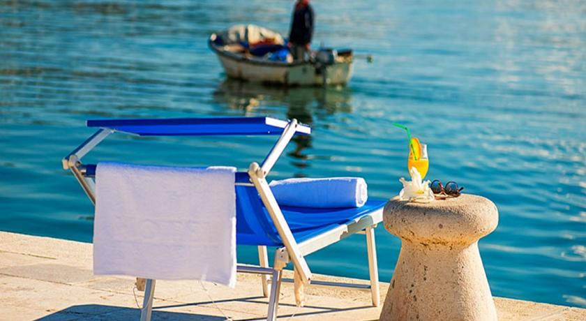 Lounger and boat in Herceg Novi Lounger and boat in Herceg Novi